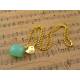 Seafoam Green Chalcedony Nugget with Gold Bird Necklace