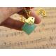 Seafoam Green Chalcedony Nugget with Gold Bird Necklace