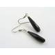 A different pair of earrings, available separately