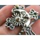 Ornate Crystal-Set Cross Necklace with Moon and Sun