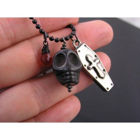 Black Necklace with carved Stone Skull, Silver Coffin Charm and Red Glass Drop