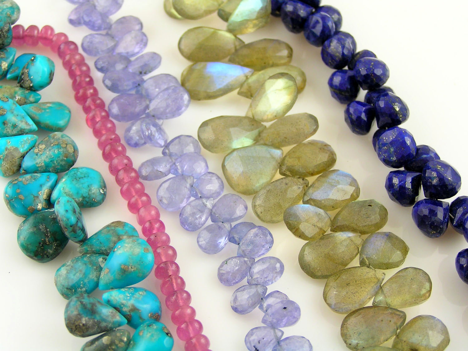 American turquoise, pink sapphire, tanzanite, labradorite, lapis lazuli